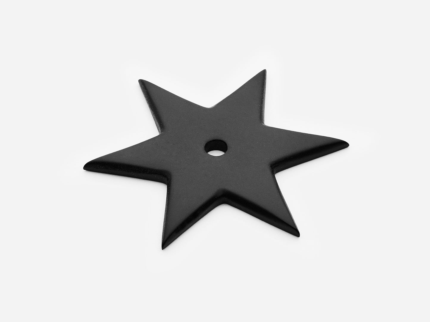 Solid brass 6-Point Star backplate, in a matte black finish for knobs on cabinets.