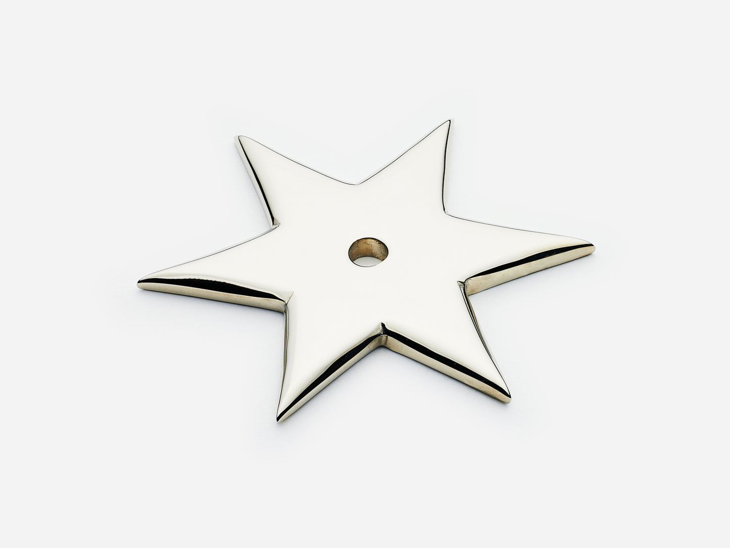 Solid brass 6-Point Star backplate, in a polished nickel finish for knobs on cabinets.