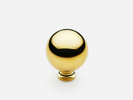 Solid brass Ball Knob, standard size, in an unlacquered polished brass finish for cabinets.