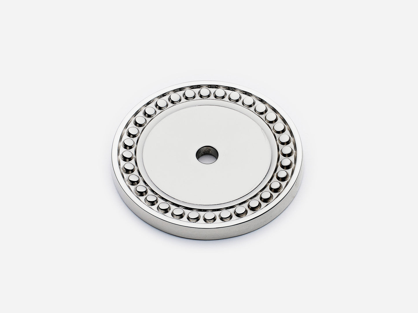 Solid brass Beaded Round backplate, in a polished nickel finish for knobs on cabinets.