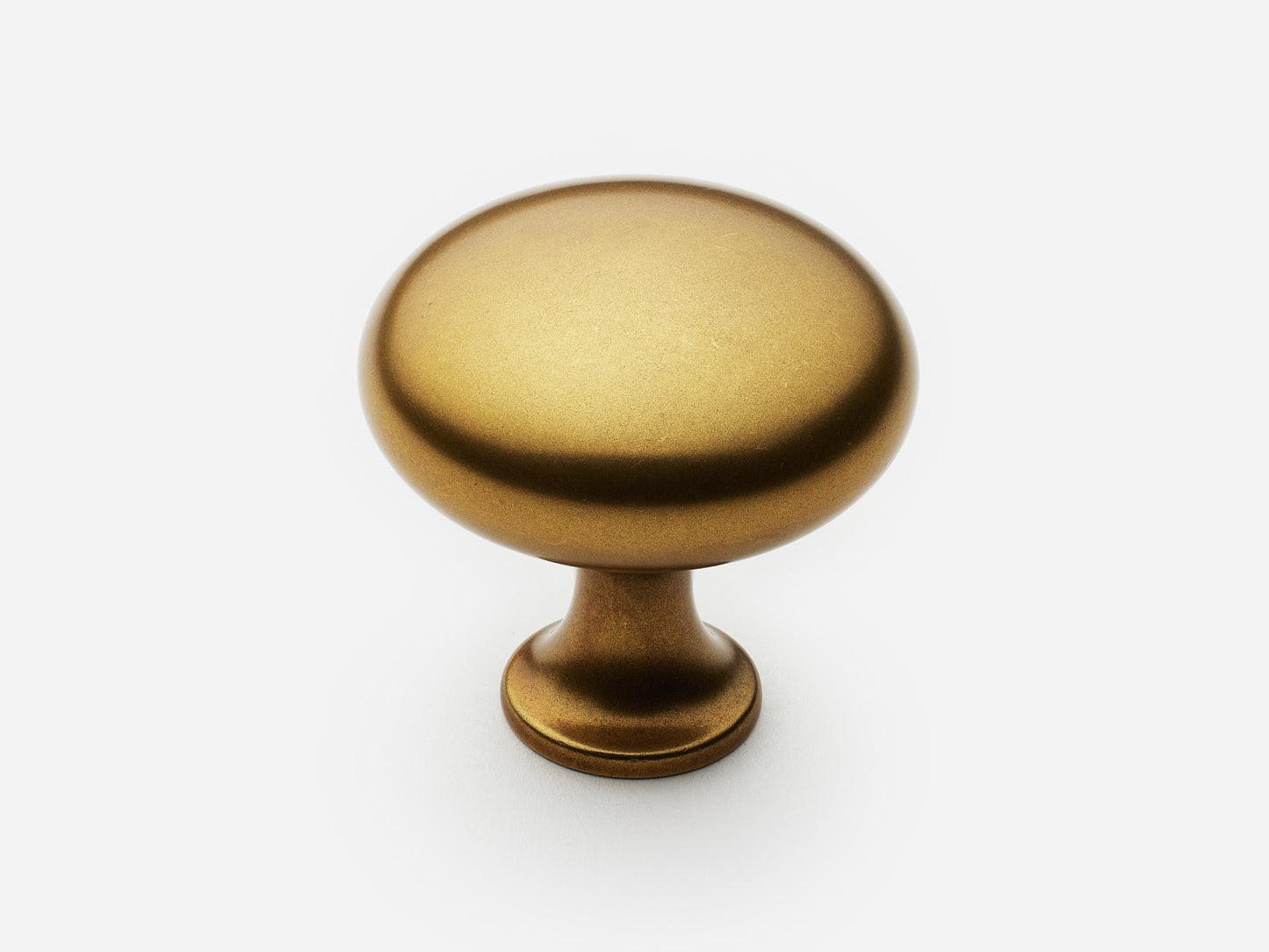 Solid brass Belle Knob, large size, in an aged brass finish for cabinets.