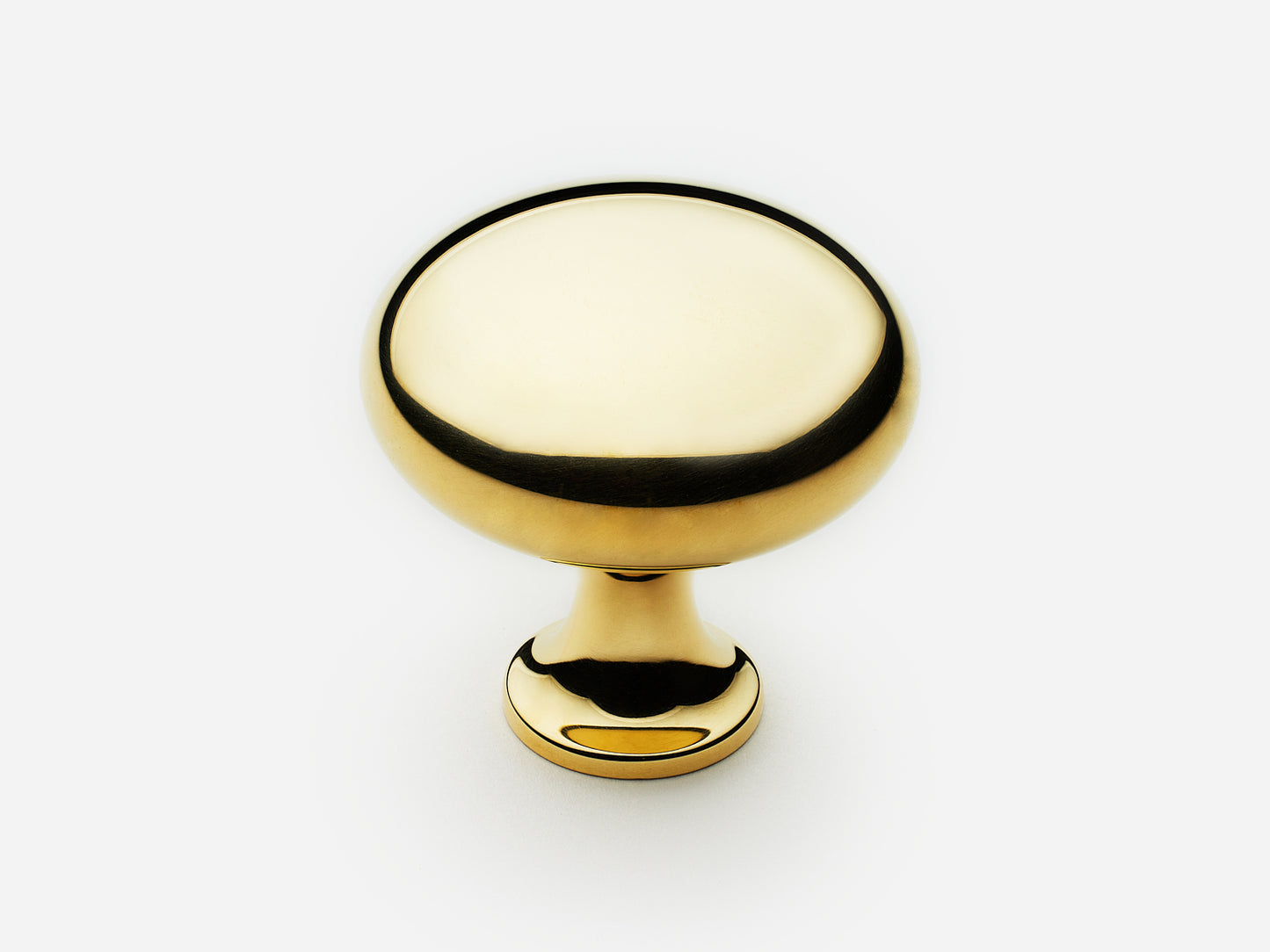 Solid brass Belle Knob, large size, in an unlacquered polished brass finish for cabinets.