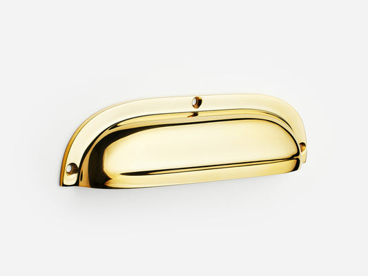 Solid brass Admiral bin pull, 6 inches, in an unlacquered polished brass finish for cabinets.