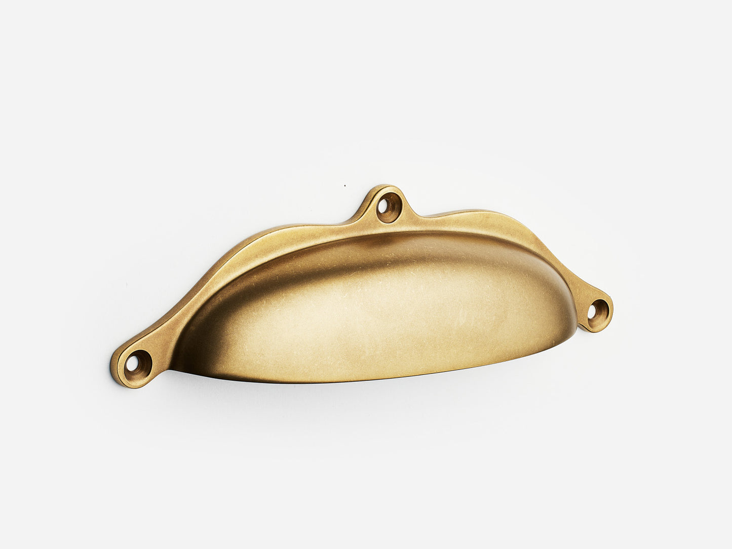 Solid brass Grace bin pull, 6 inches, in an aged brass finish for cabinets.