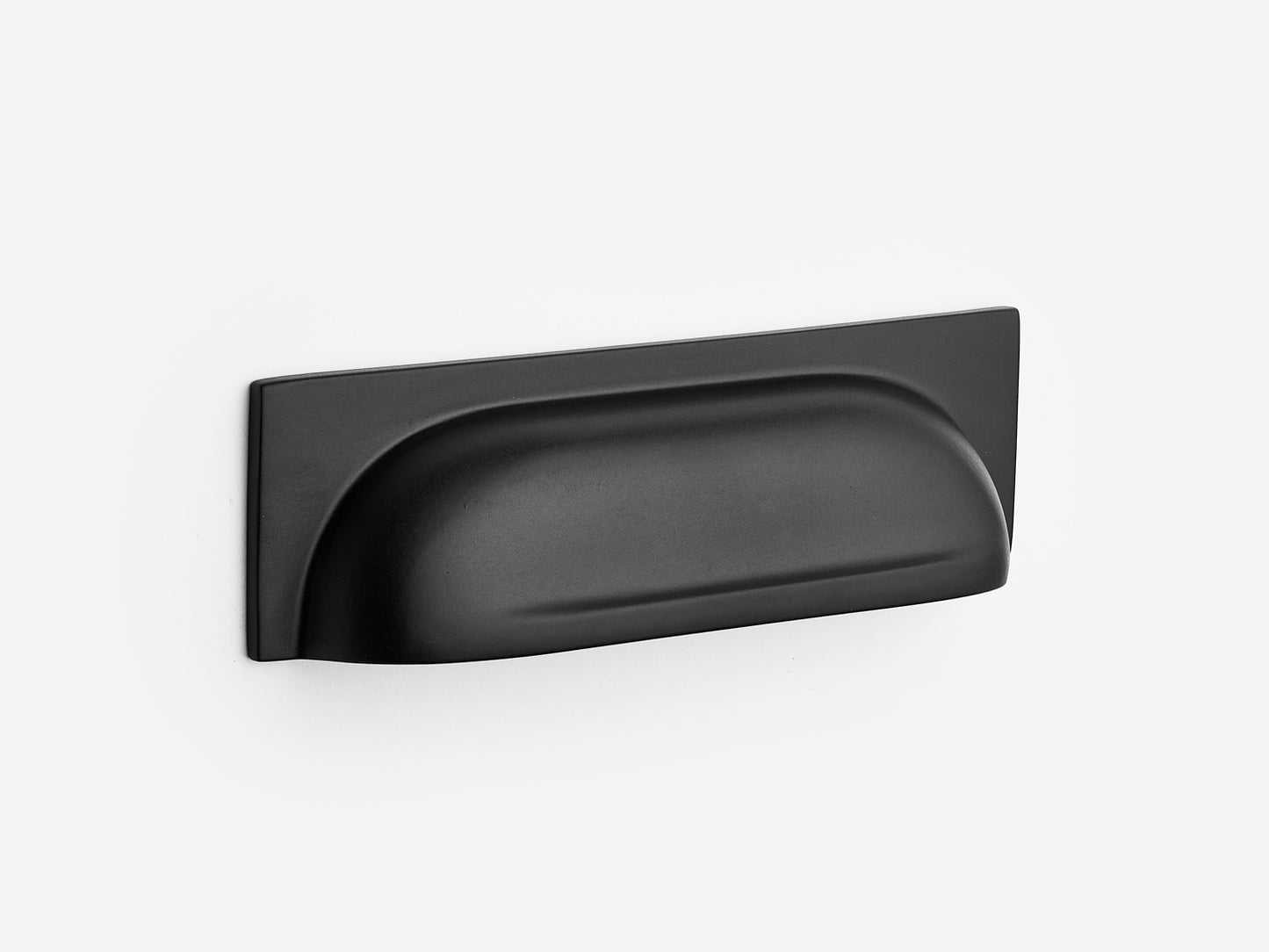 Solid brass Suffolk bin pull, 4 inches, in a matte black finish for cabinets.