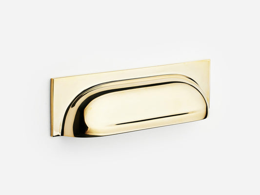 Solid brass Suffolk bin pull, 4 inches, in an unlacquered polished brass finish for cabinets.
