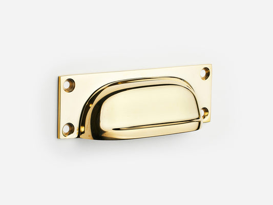 Solid brass Yorkshire bin pull, 4 inches, in an unlacquered polished brass finish for cabinets.