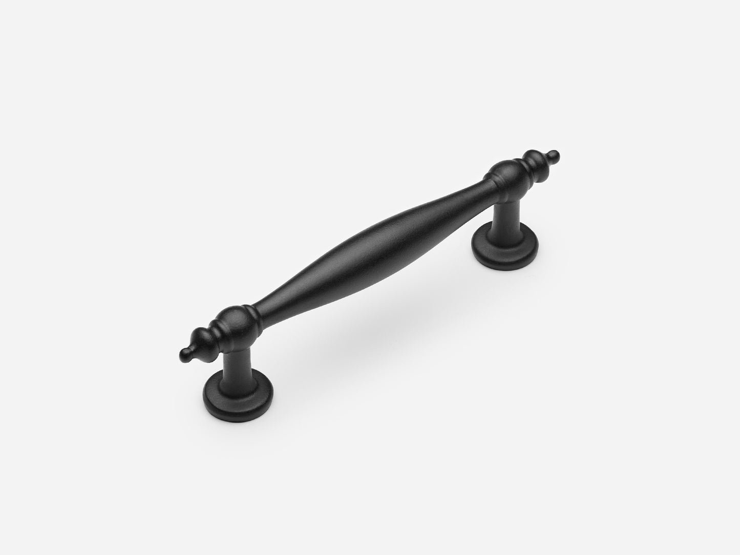 Solid brass Bougie drawer pull, 4 inches, in a matte black finish for cabinets.