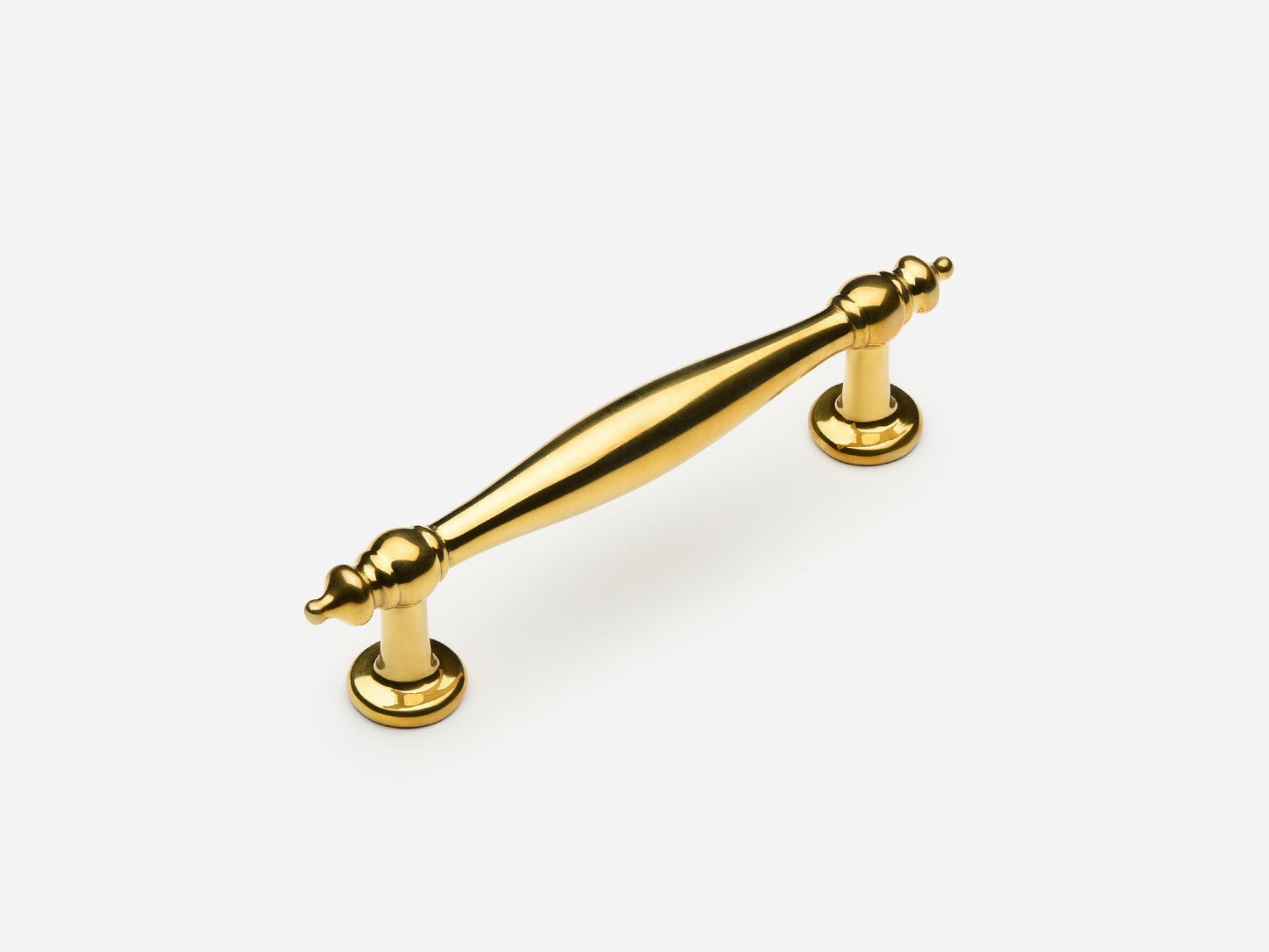 Solid brass Bougie drawer pull, 4 inches, in an unlacquered polished brass finish for cabinets.