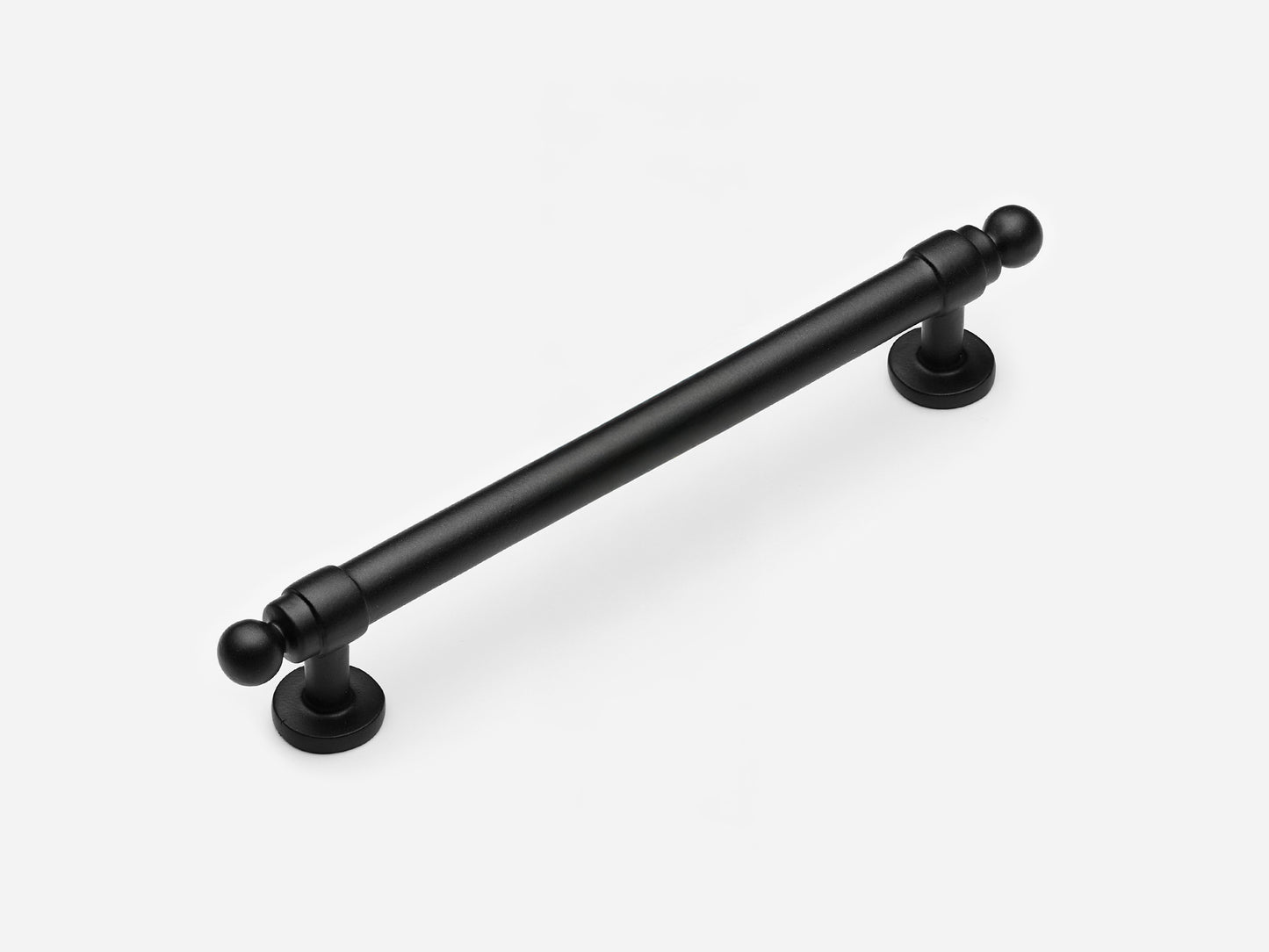 Solid brass Campaign drawer pull, 6 inches, in a matte black finish for cabinets.