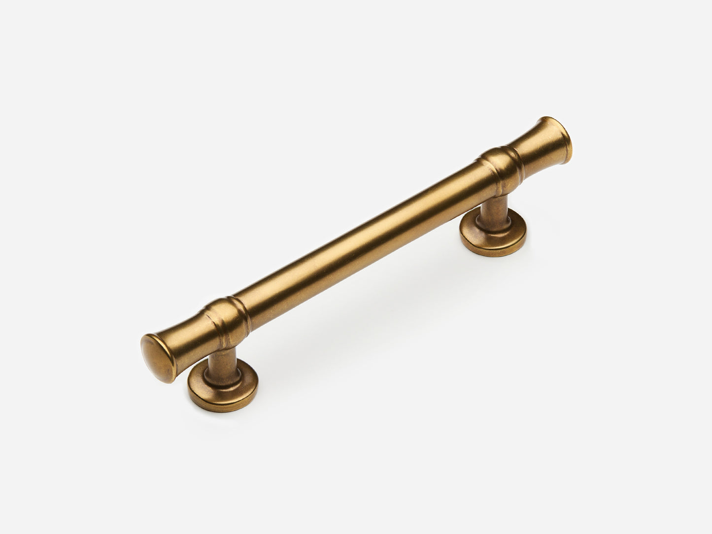Solid brass Heritage drawer pull, 4 inches, in an aged brass finish for cabinets.