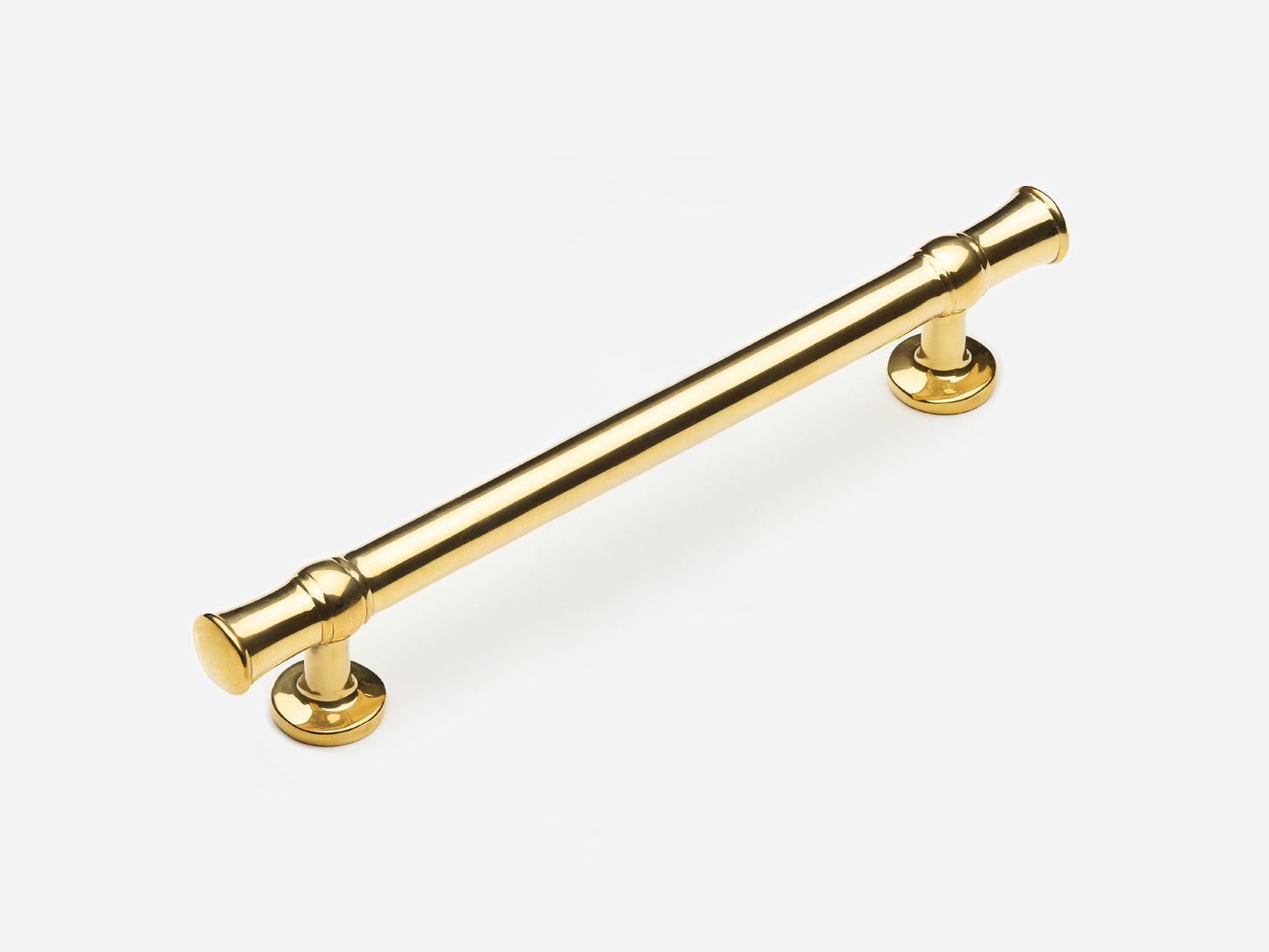 Solid brass Heritage drawer pull, 6 inches, in an unlacquered polished brass finish for cabinets.