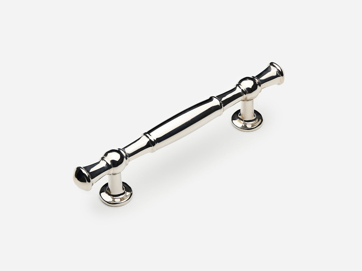 Solid brass Windsor drawer pull, 4 inches, in a polished nickel finish for cabinets.