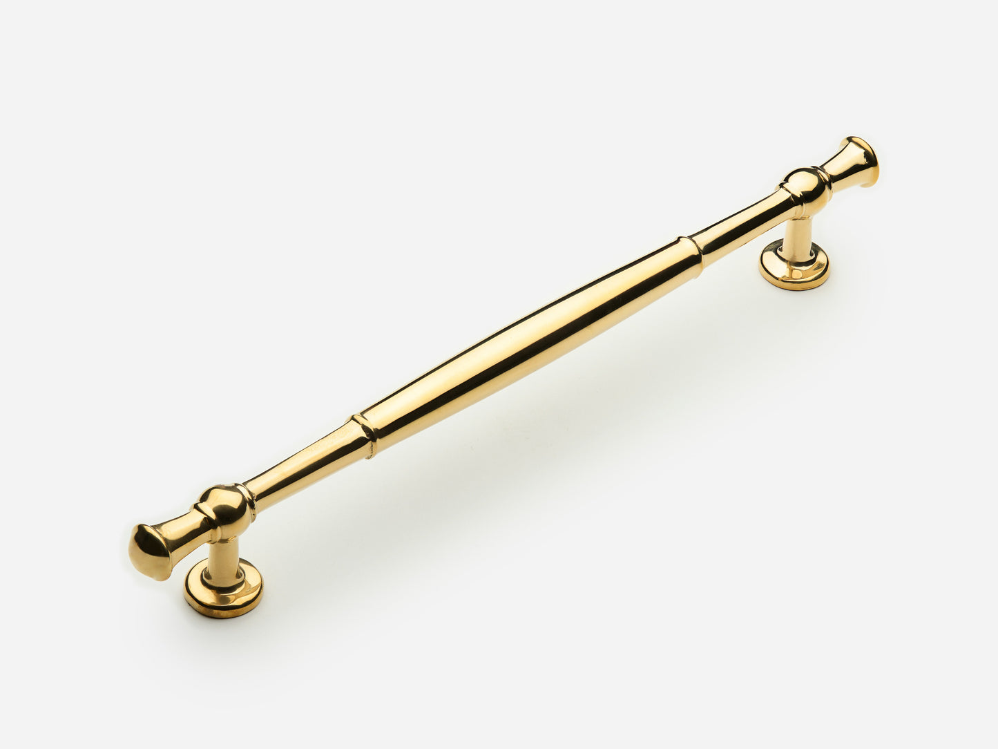 Solid brass Windsor drawer pull, 8 inches, in an unlacquered polished brass finish for cabinets.