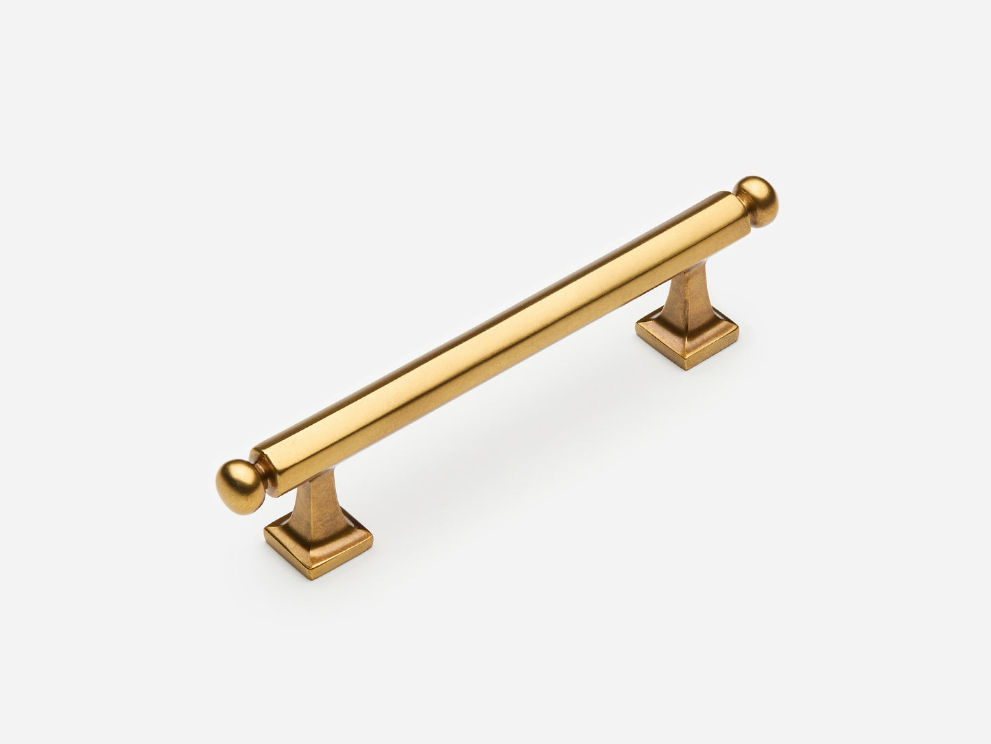 Solid brass Wright drawer pull, 4 inches, in an aged brass finish for cabinets.