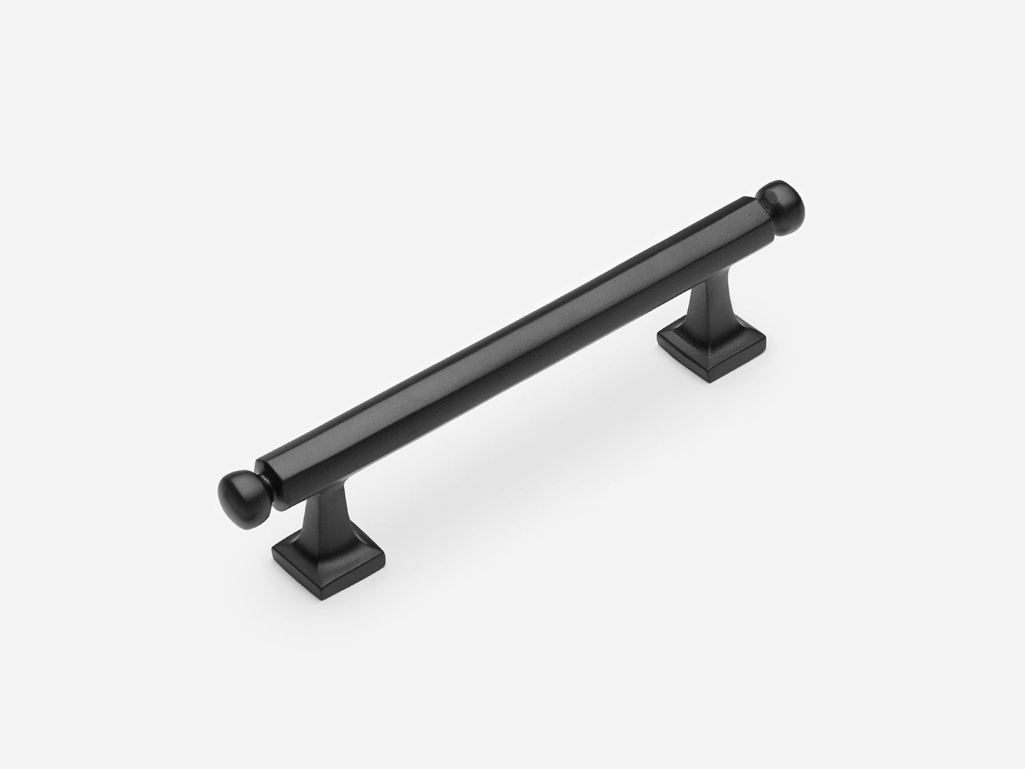 Solid brass Wright drawer pull, 4 inches, in a matte black finish for cabinets.