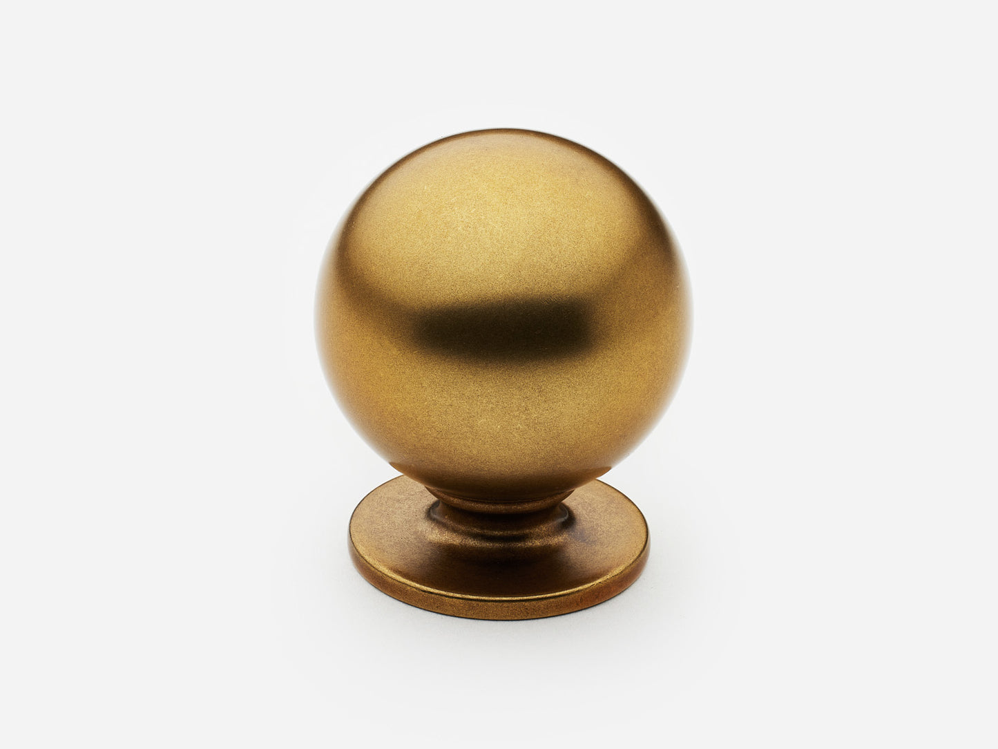 Solid brass Luxe Ball Knob, large size, in a aged brass finish for cabinets.