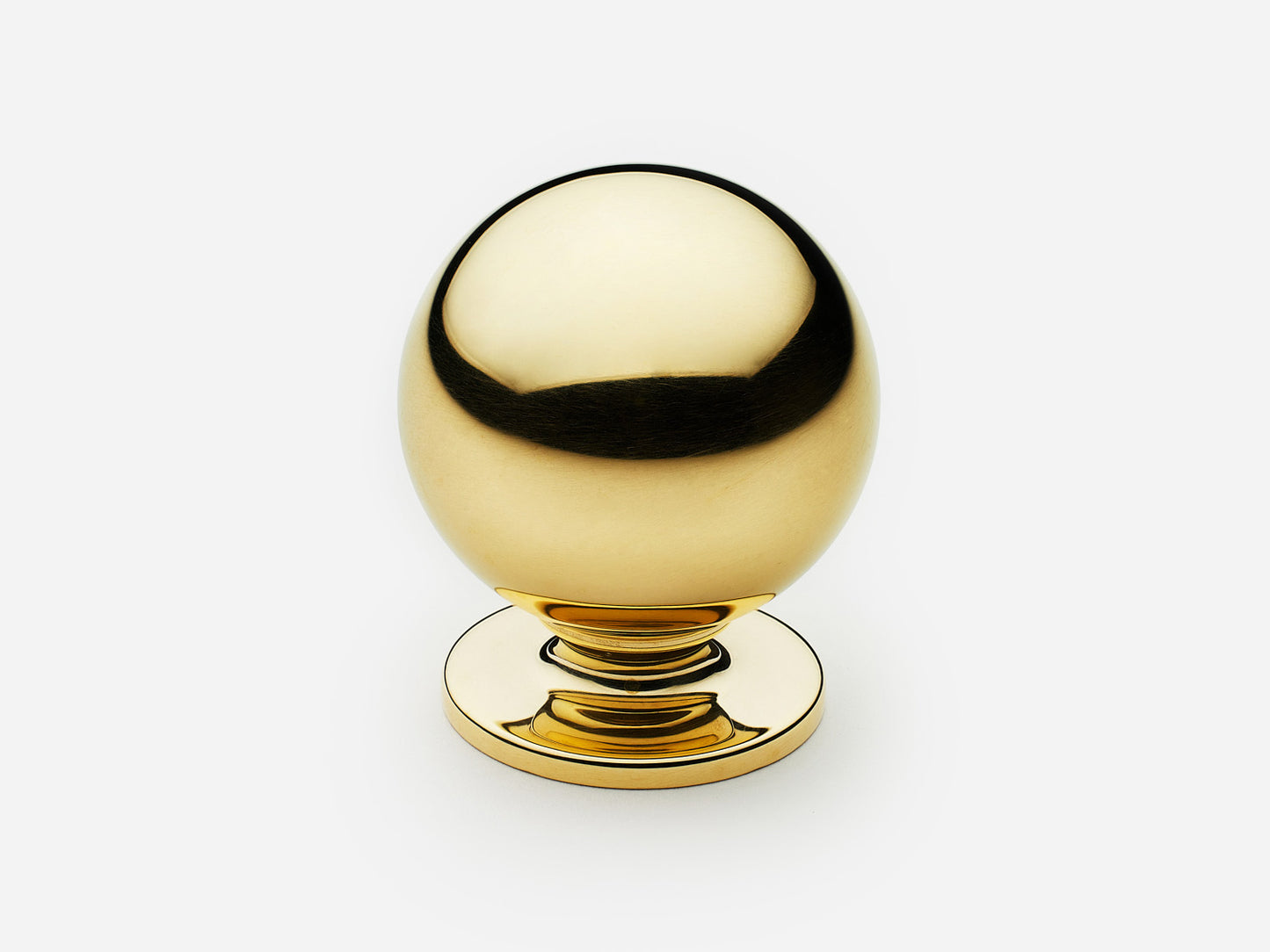 Solid brass Luxe Ball Knob, large size, in an unlacquered polished brass finish for cabinets.