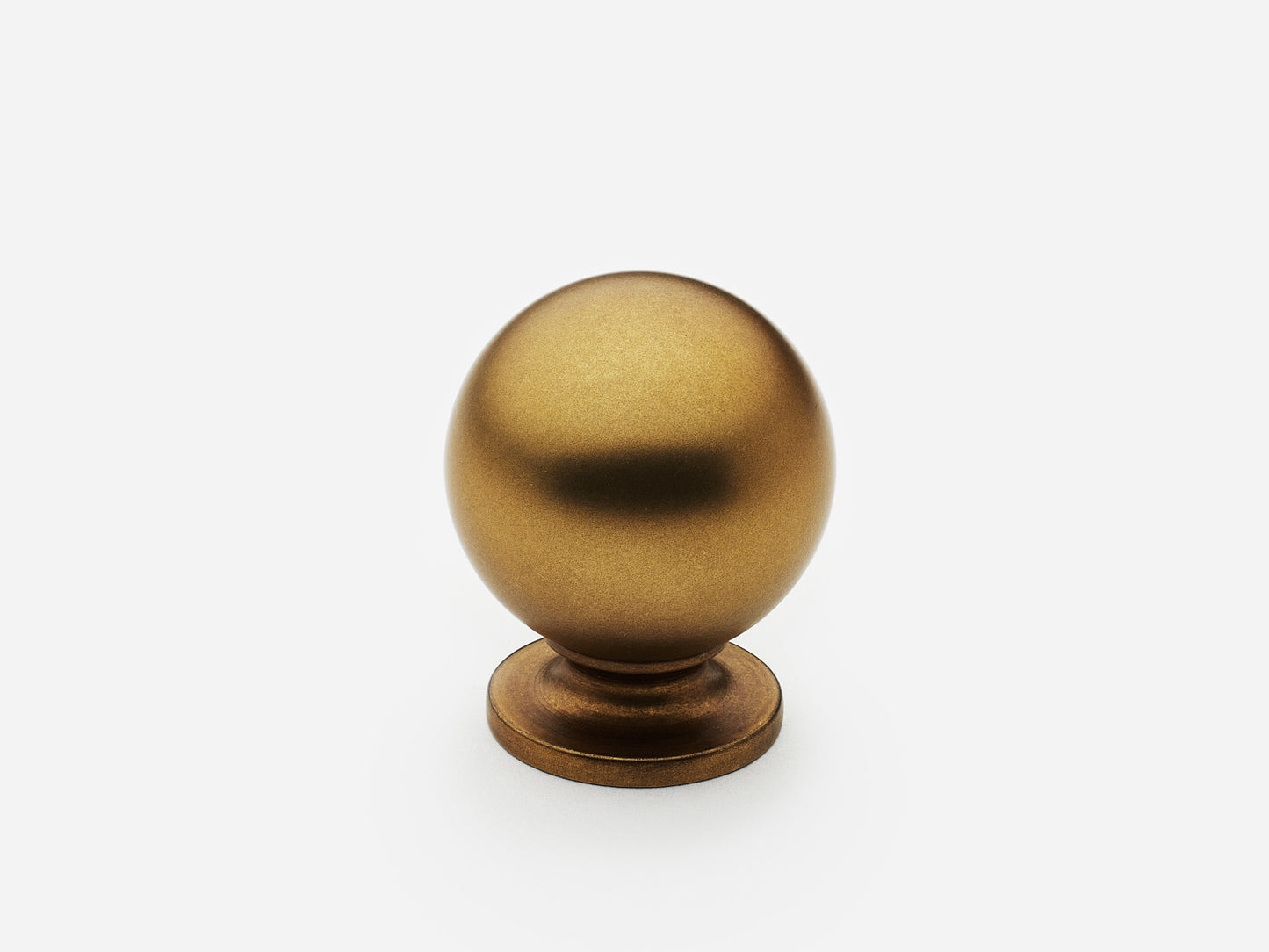 Solid brass Luxe Ball Knob, standard size, in an aged brass finish for cabinets.