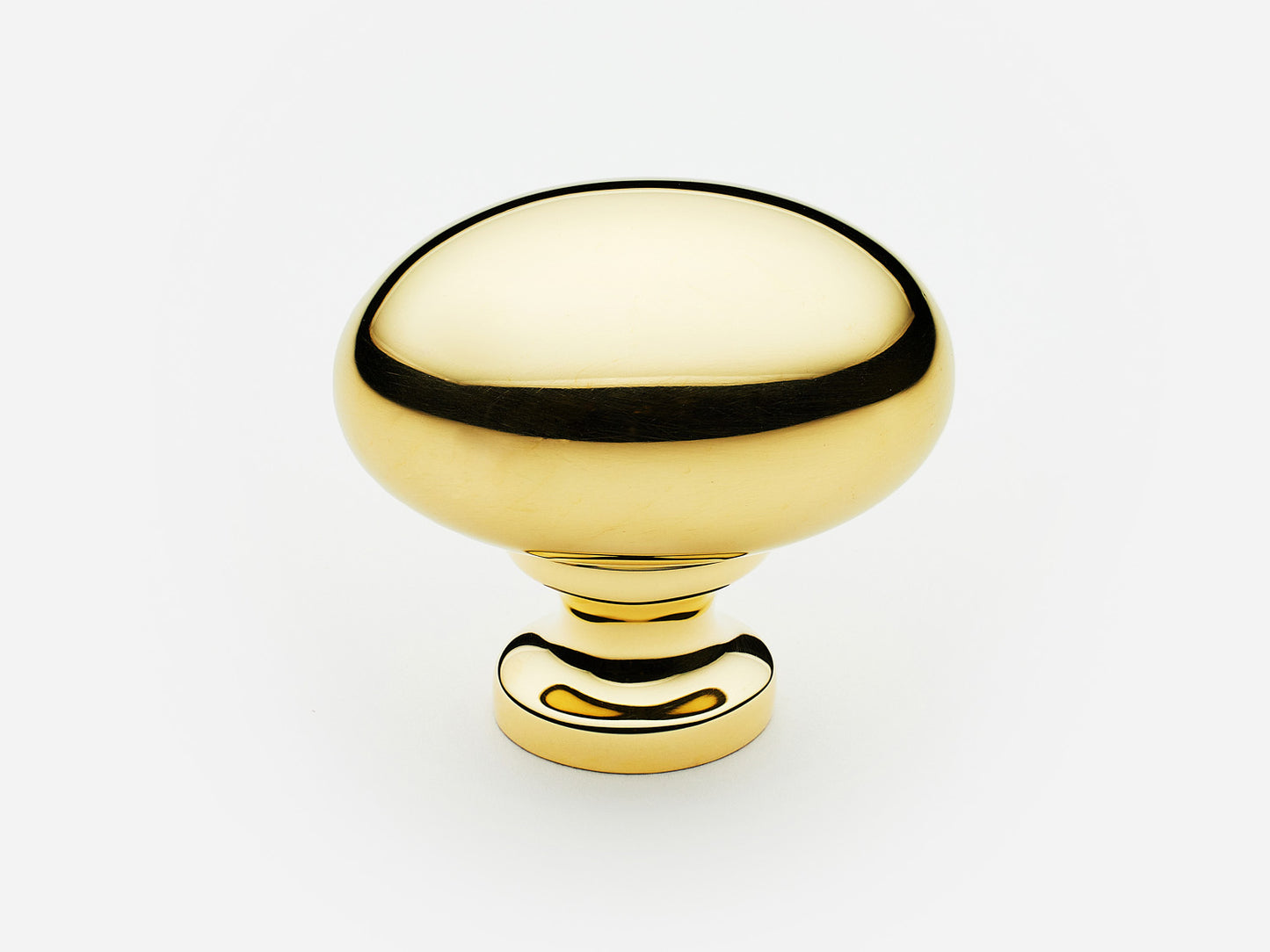 Solid brass Oval Knob, large size, in an unlacquered polished brass finish for cabinets.