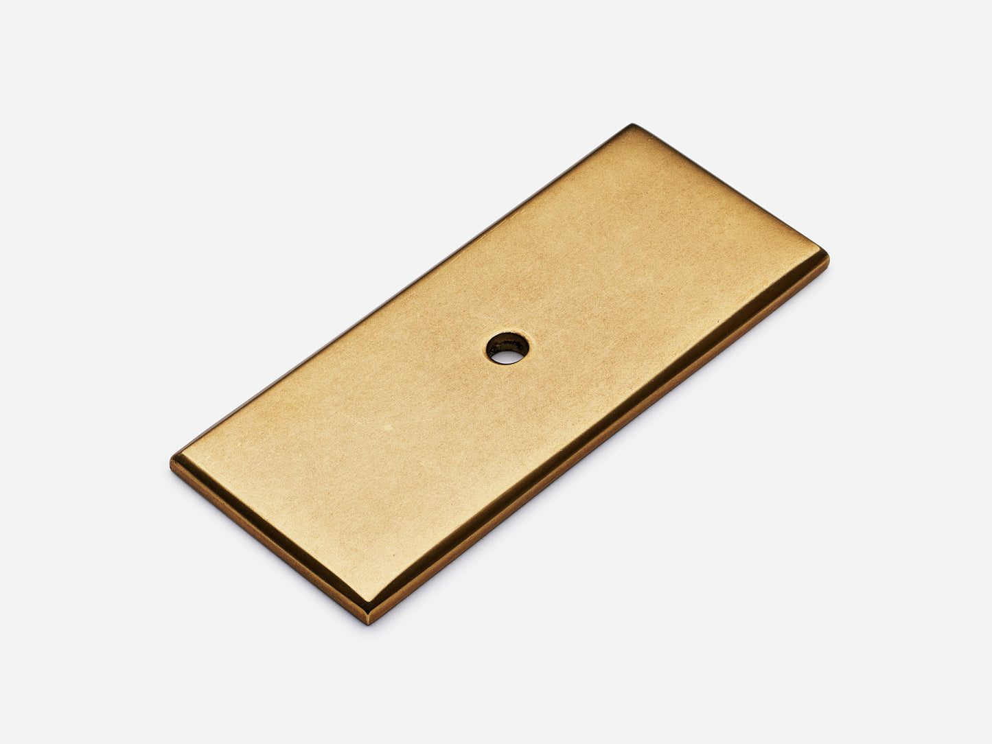 Solid brass rectangular backplate, 1.25x3 inches, aged brass finish for knobs and pulls on cabinets.