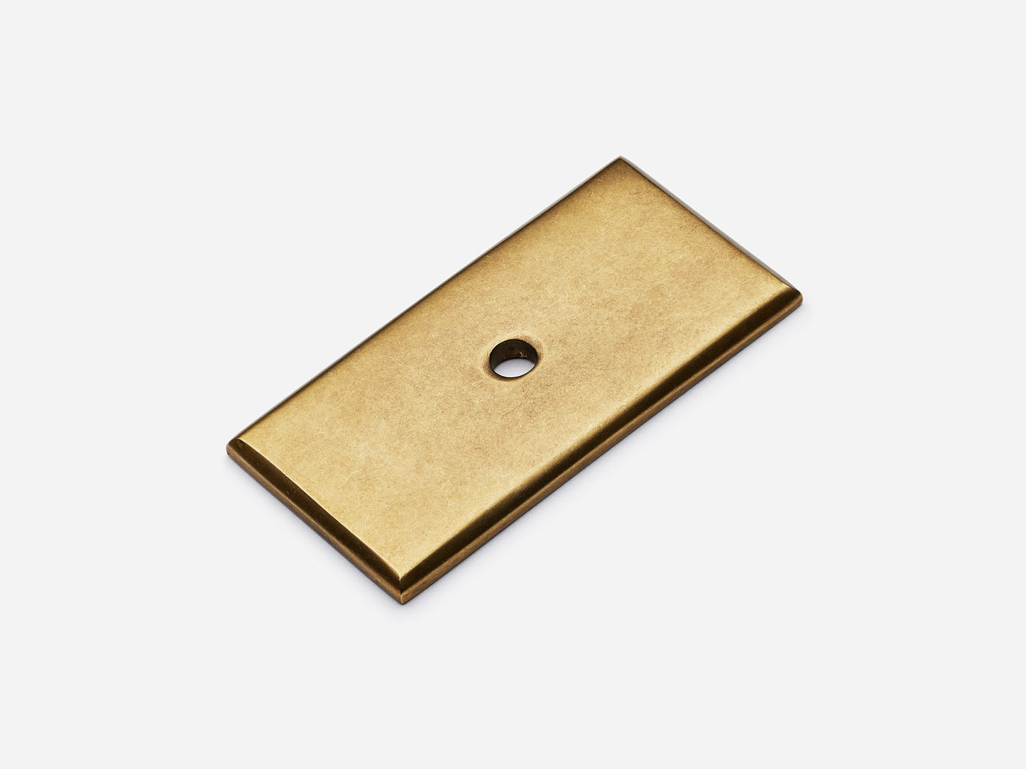 Solid brass rectangular backplate, 1x2 inches, aged brass finish for knobs and pulls on cabinets.