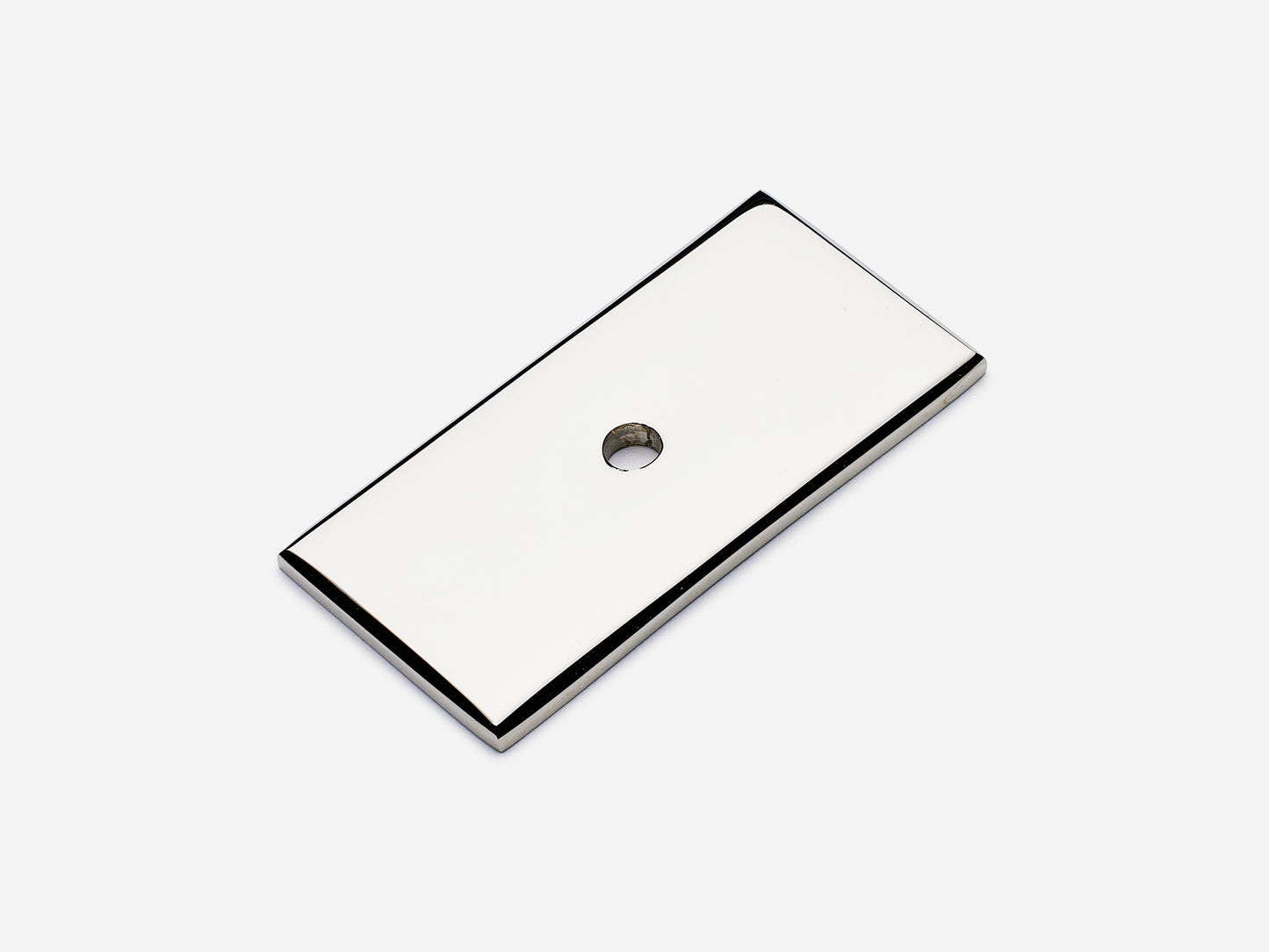 Solid brass rectangular backplate, 1x2 inches, polished nickel finish for knobs and pulls on cabinets.