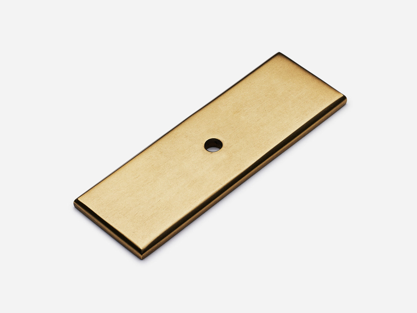 Solid brass rectangular backplate, 1x3 inches, aged brass finish for knobs and pulls on cabinets.