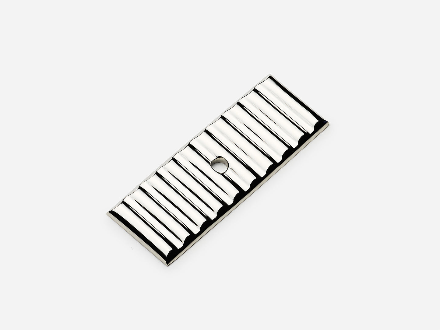 Solid brass Reeded backplate, 1x2.5 inches, in a polished nickel finish for knobs on cabinets.