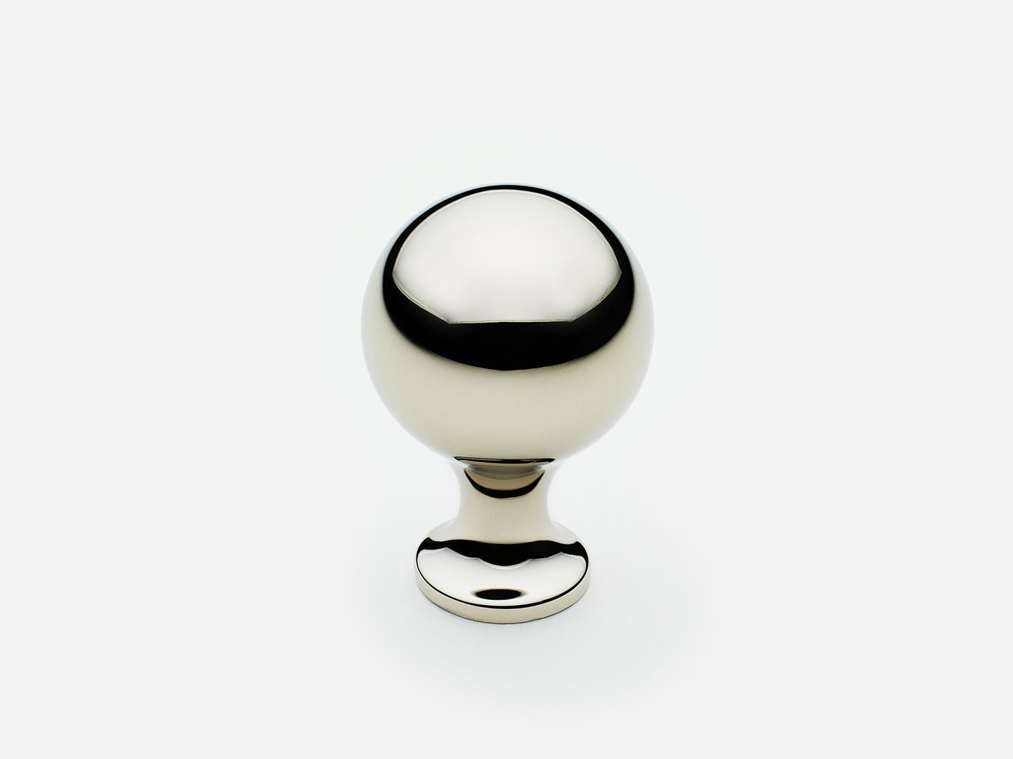 Solid brass Serenity Knob, standard size, in a polished nickel finish for cabinets.
