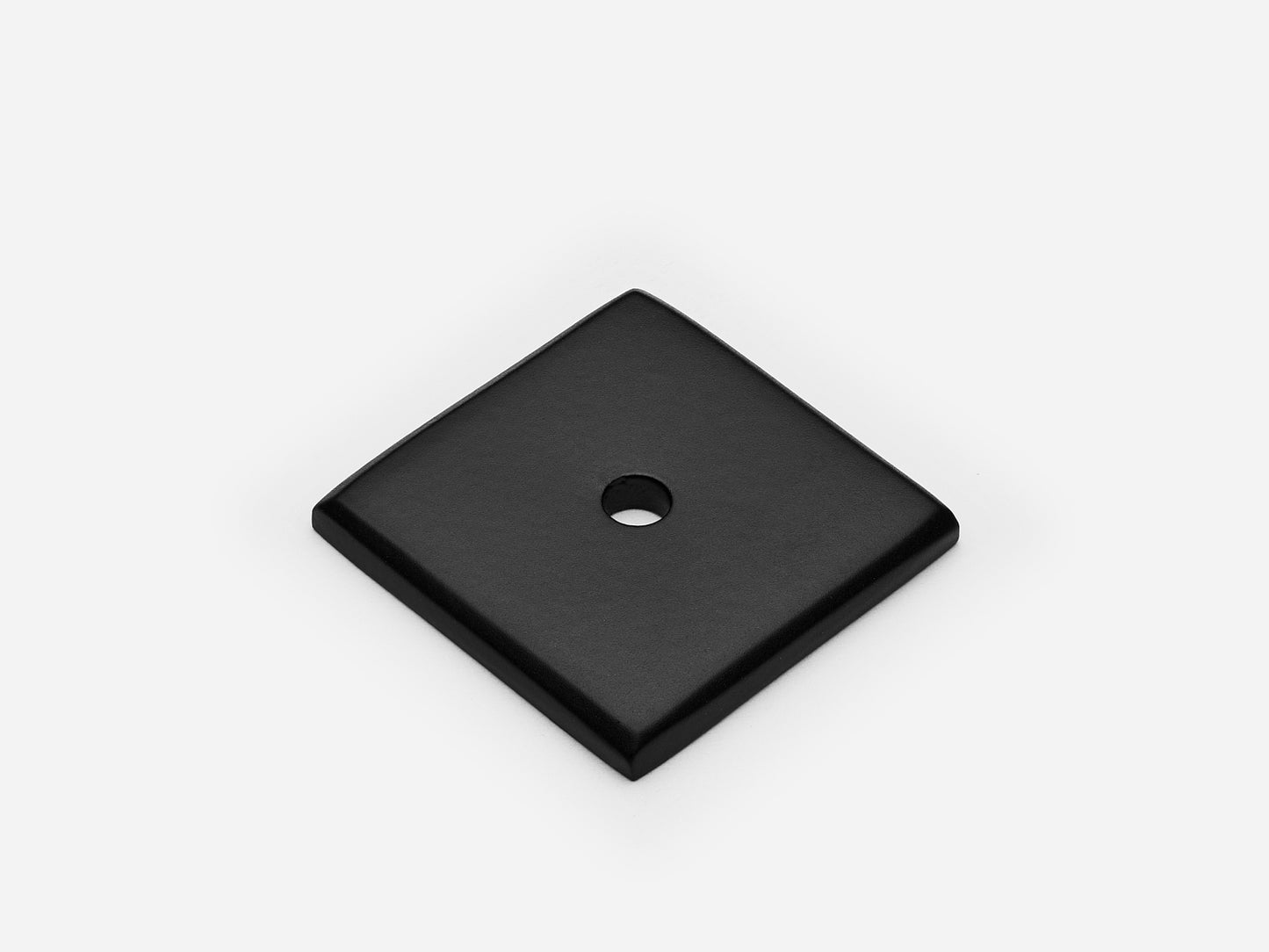 Solid brass Square backplate, 1.25 inches, in a matte black finish for knobs on cabinets.
