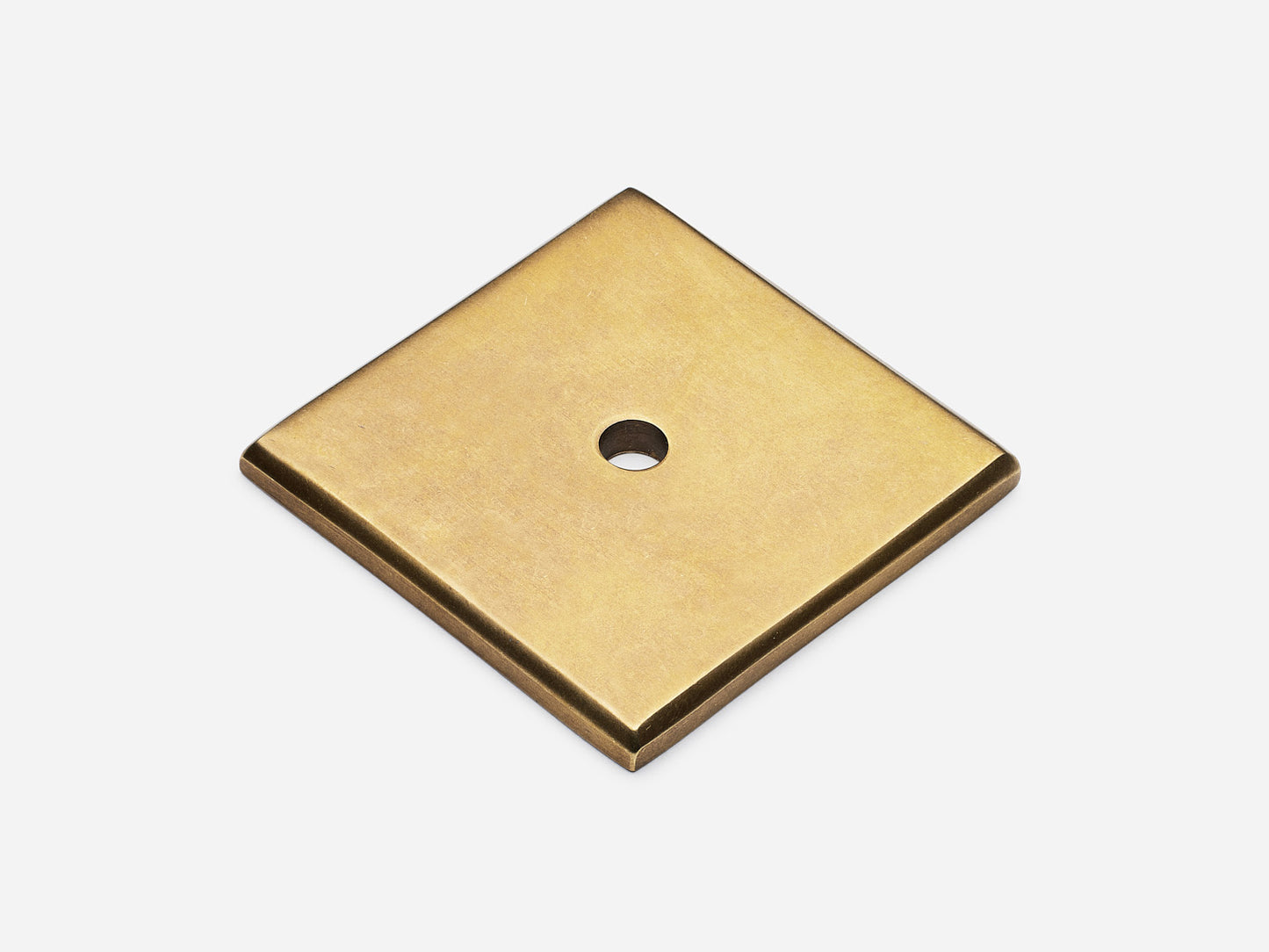 Solid brass Square backplate, 1.5 inches, in an aged brass finish for knobs on cabinets.