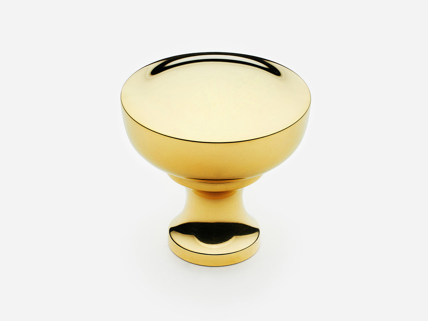 Solid brass Triumph Knob, large size, in an unlacquered polished brass finish for cabinets.