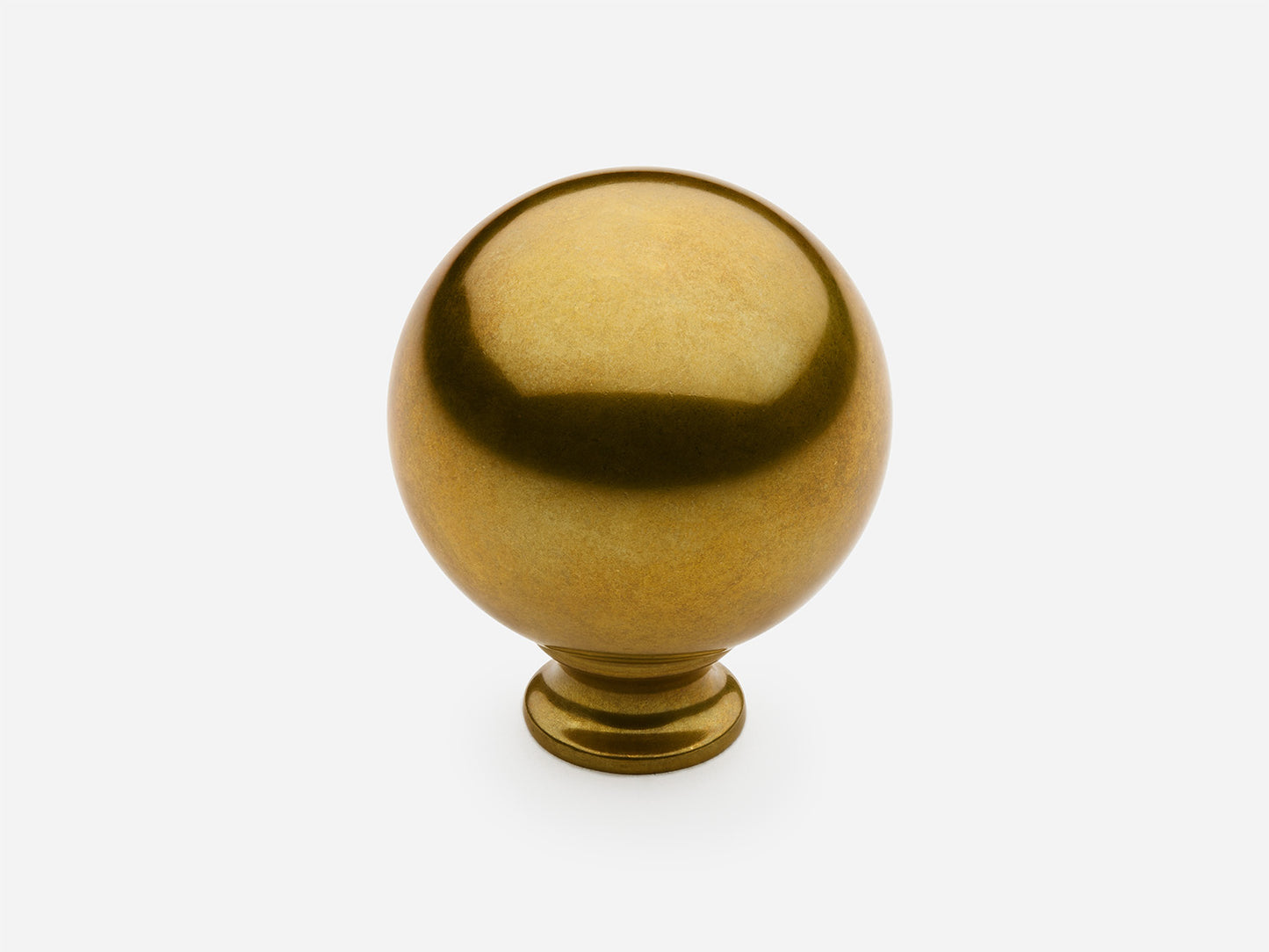 Solid brass Ball Knob, large size, in an unlacquered aged brass finish for cabinets.