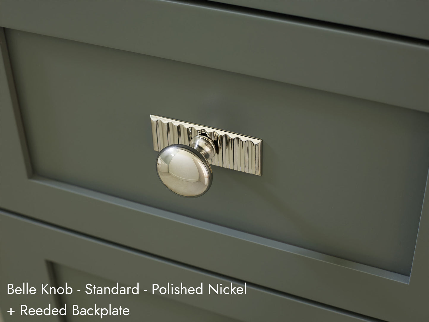 Solid brass Belle Knob, in polished nickel finish, on kitchen cabinets with Reeded Backplate.
