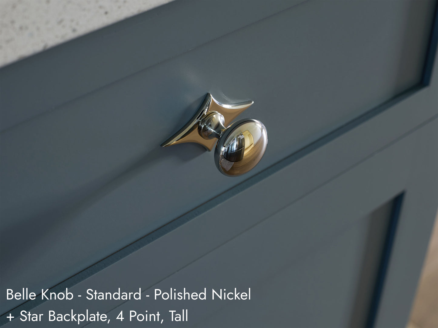 Solid brass Belle Knob, in polished nickel finish, on kitchen cabinets with Star Backplate.