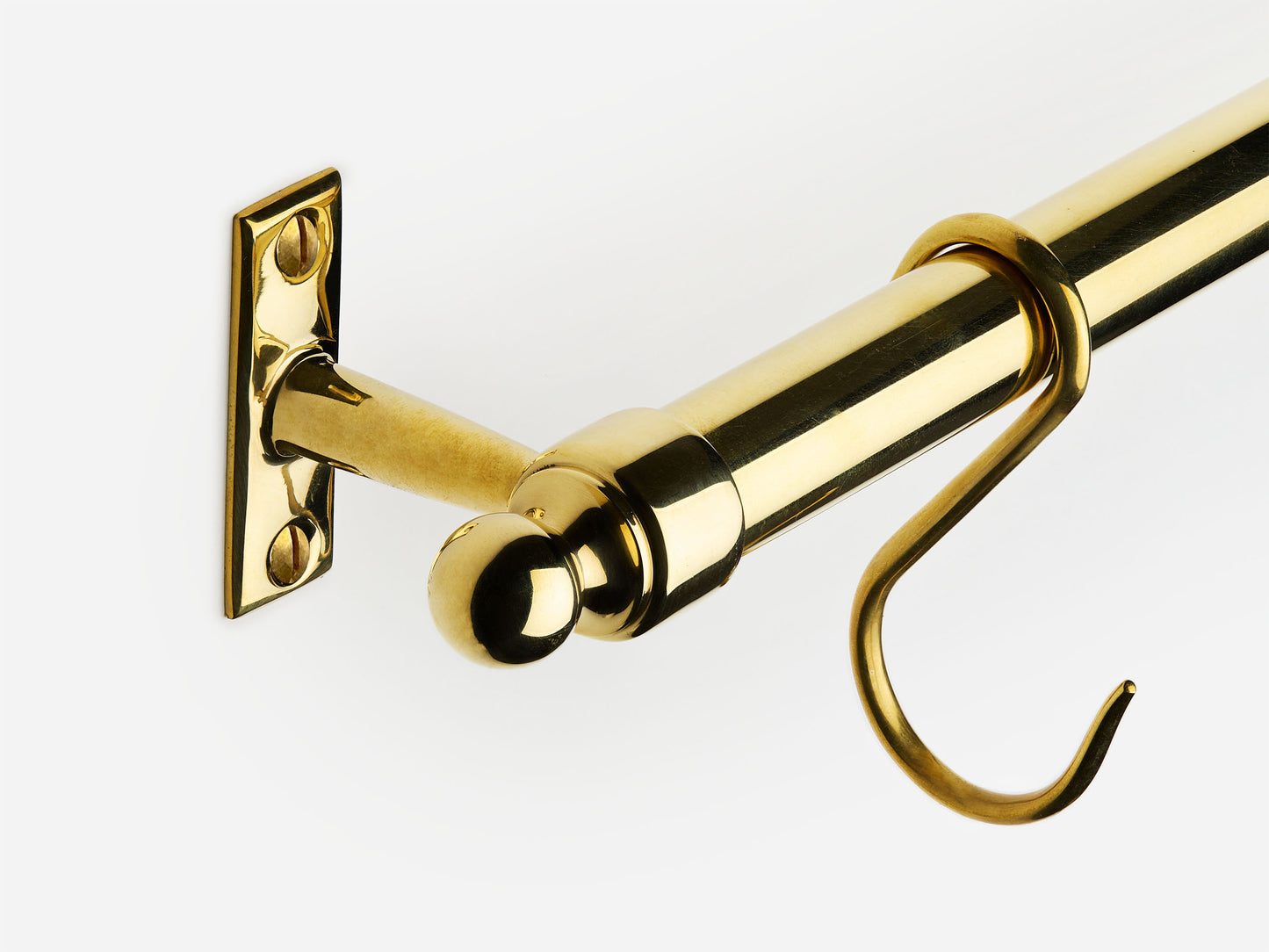 Solid brass Campaign hanging pot rail in an unlacquered polished brass finish for kitchens.