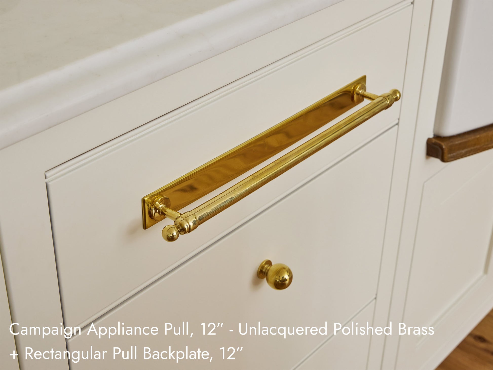 Solid brass Campaign Appliance Pull with a Rectangular Backplate, 12 inches, in unlacquered polished brass.