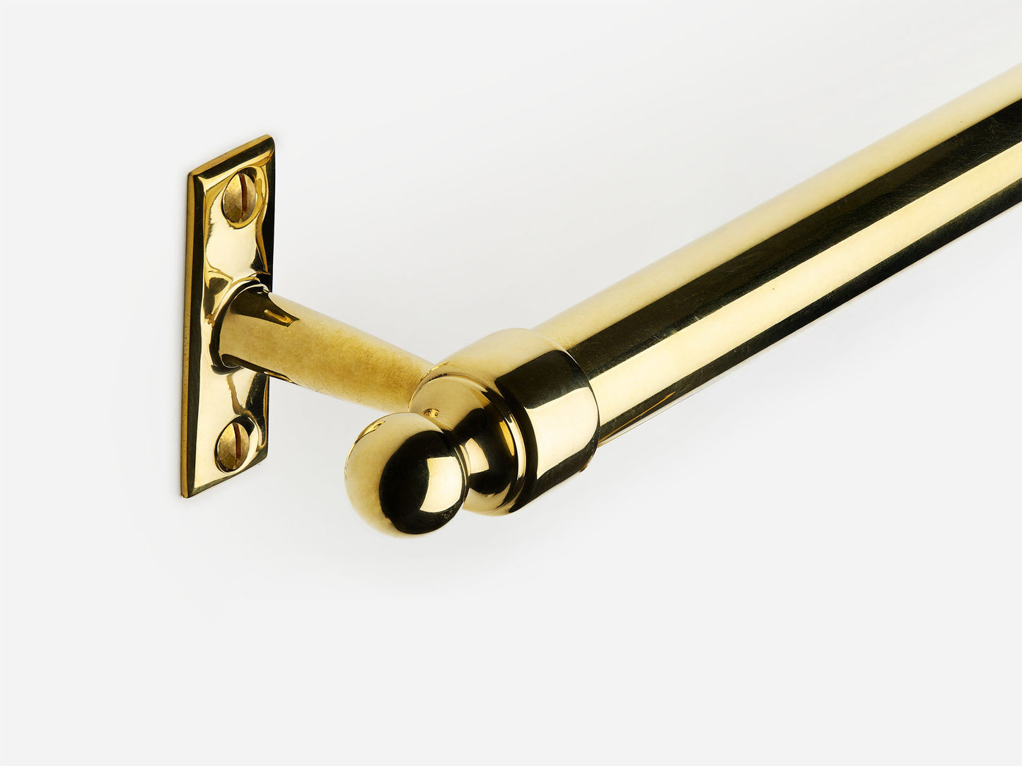 Solid brass Campaign towel bar in an unlacquered polished brass finish for kitchens and bathrooms.
