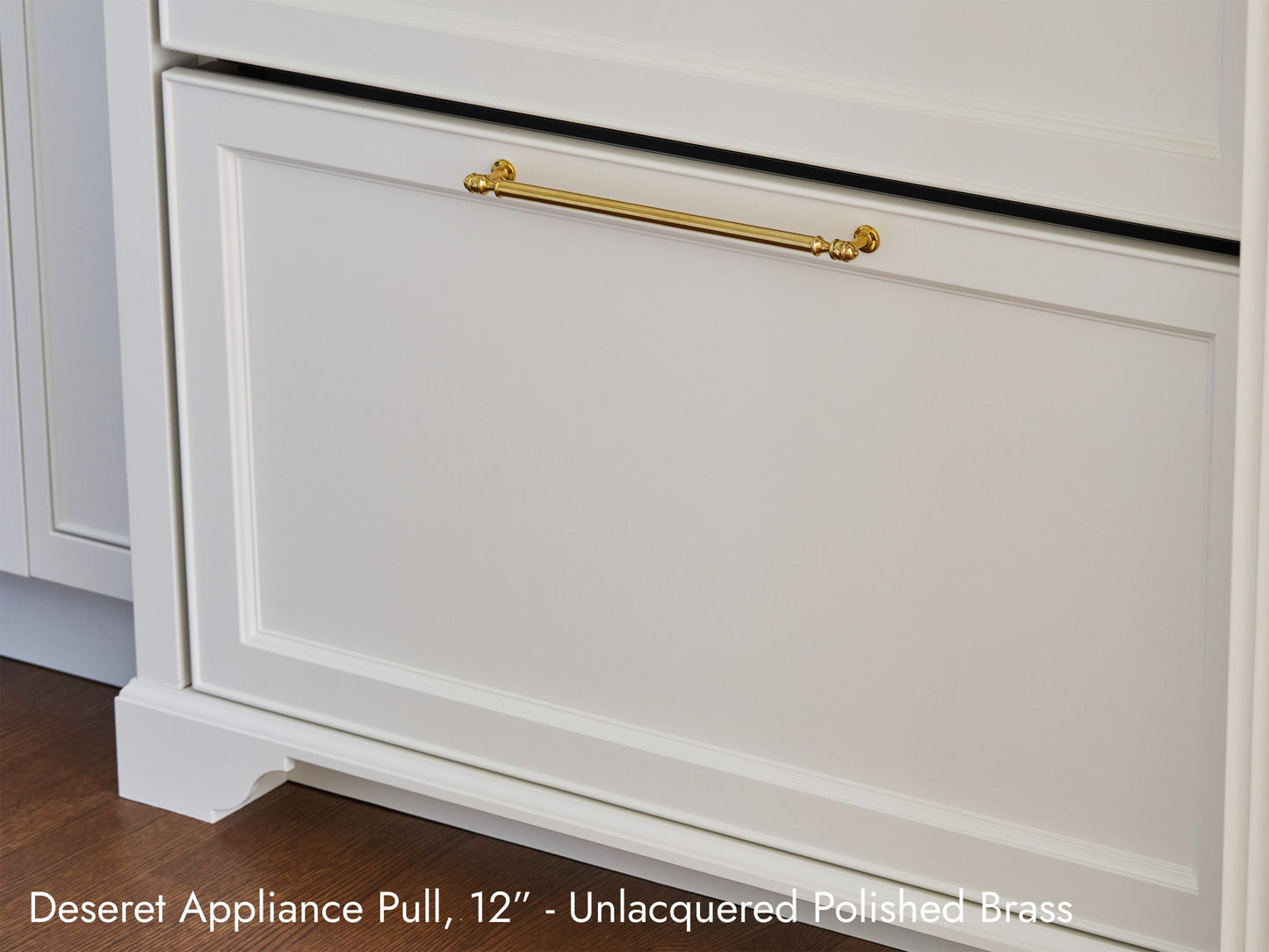 Solid brass Deseret Appliance Pull, in unlacquered polished brass, on kitchen cabinets.