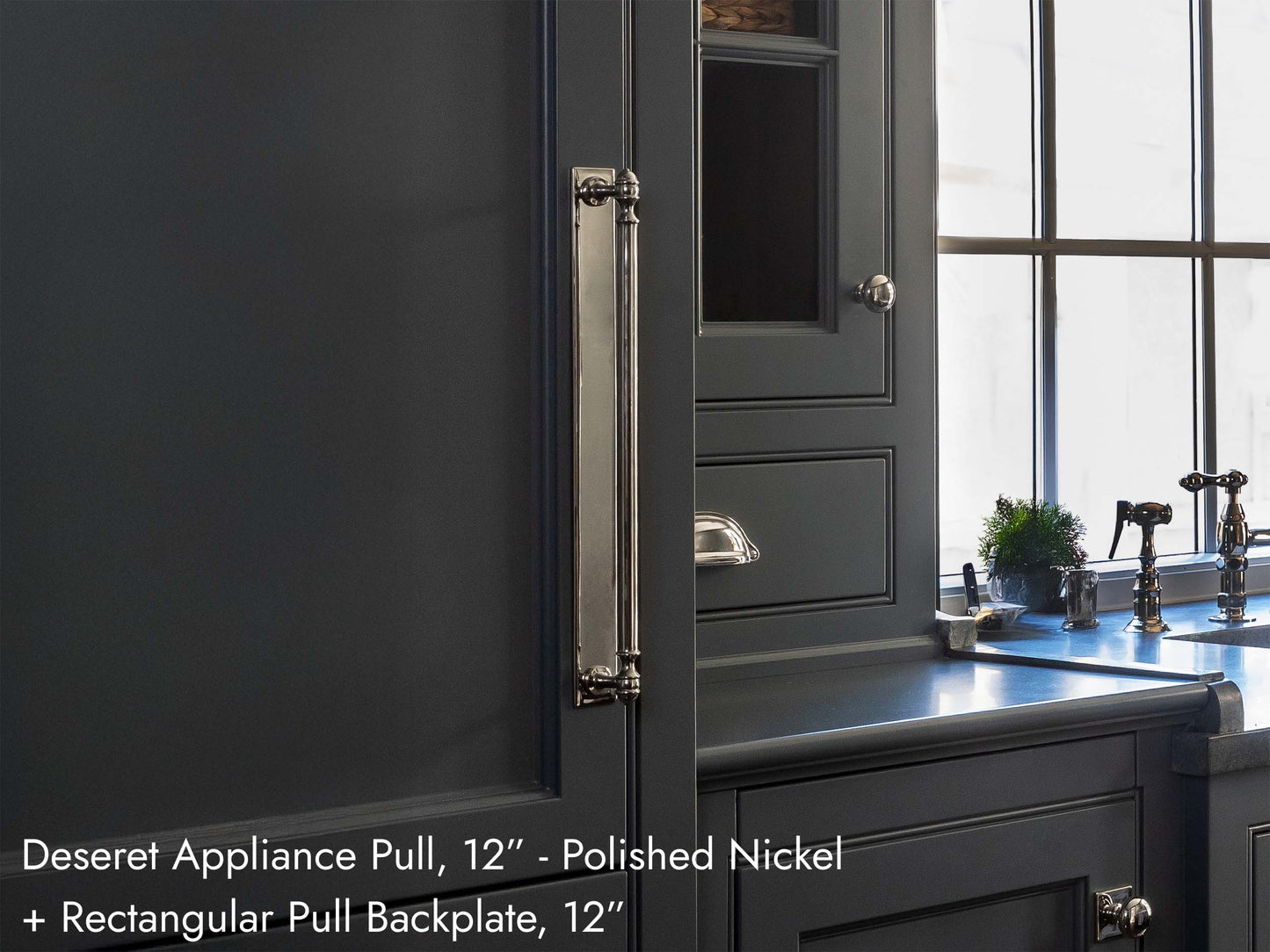 Solid brass Deseret Appliance Pull, in polished nickel, on kitchen cabinets.