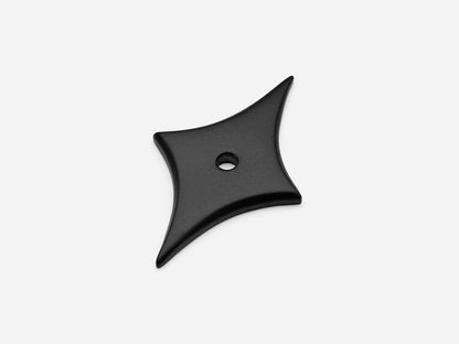 Solid brass 4-Point Tall Star backplate, in a matte black finish for knobs on cabinets.