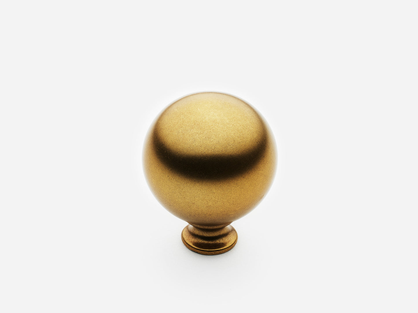 Solid brass Ball Knob, standard size, in a aged brass finish for cabinets.