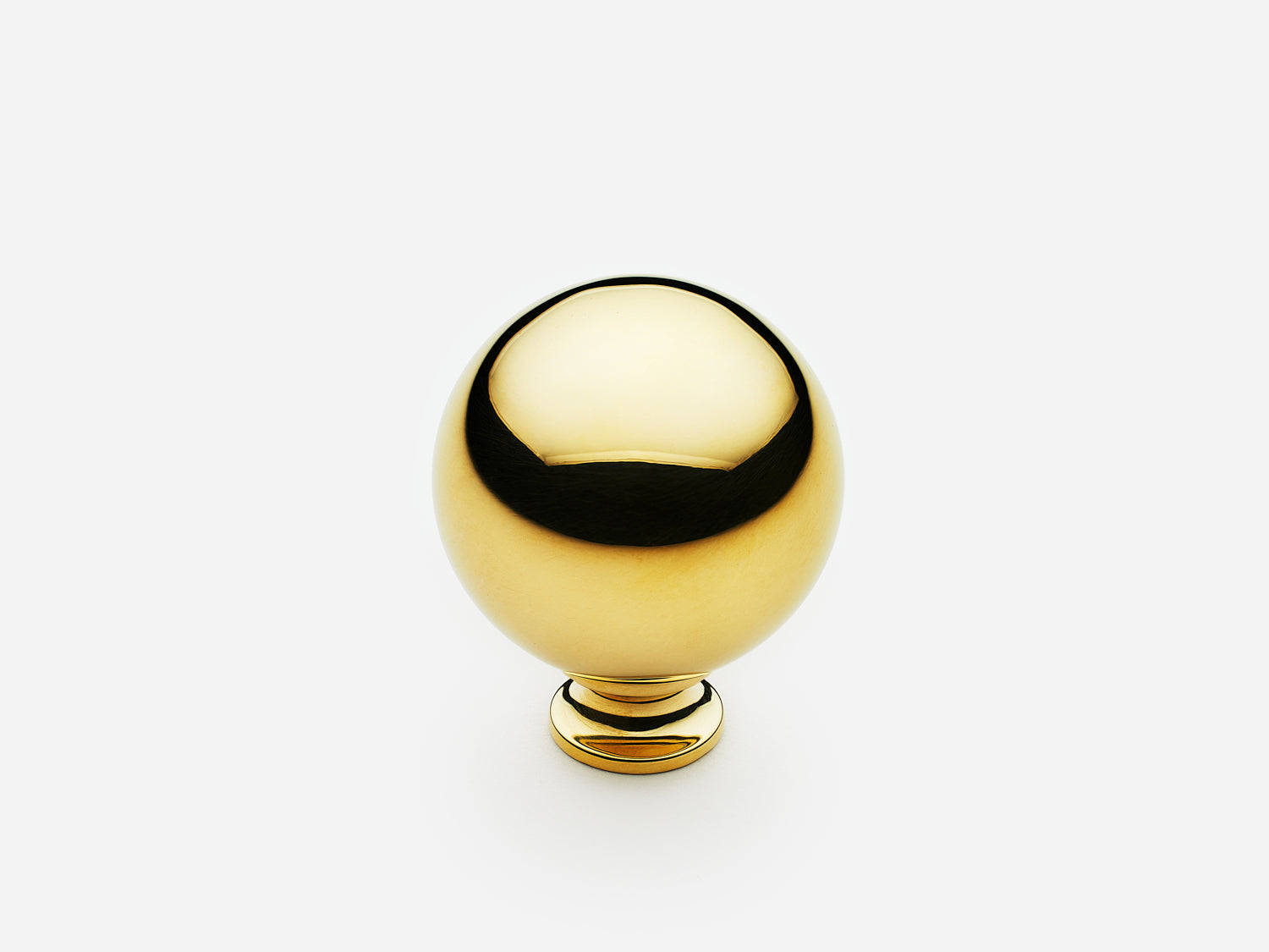 Solid brass Ball Knob, standard size, in an unlacquered polished brass finish for cabinets.