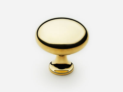 Solid brass Belle Knob, large size, in an unlacquered polished brass finish for cabinets.