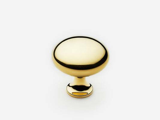 Solid brass Belle Knob, standard size, in an unlacquered polished brass finish for cabinets.