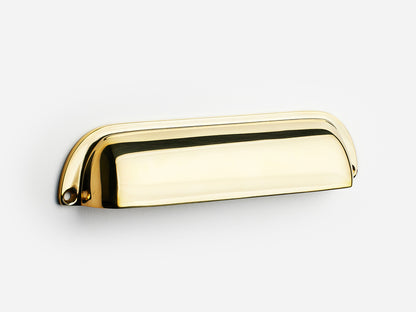Solid brass Dane bin pull, 6 inches, in an unlacquered polished brass finish for cabinets.