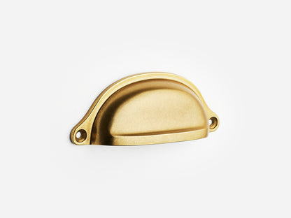 Solid brass Liberty bin pull, 4 inches, in an aged brass finish for cabinets.