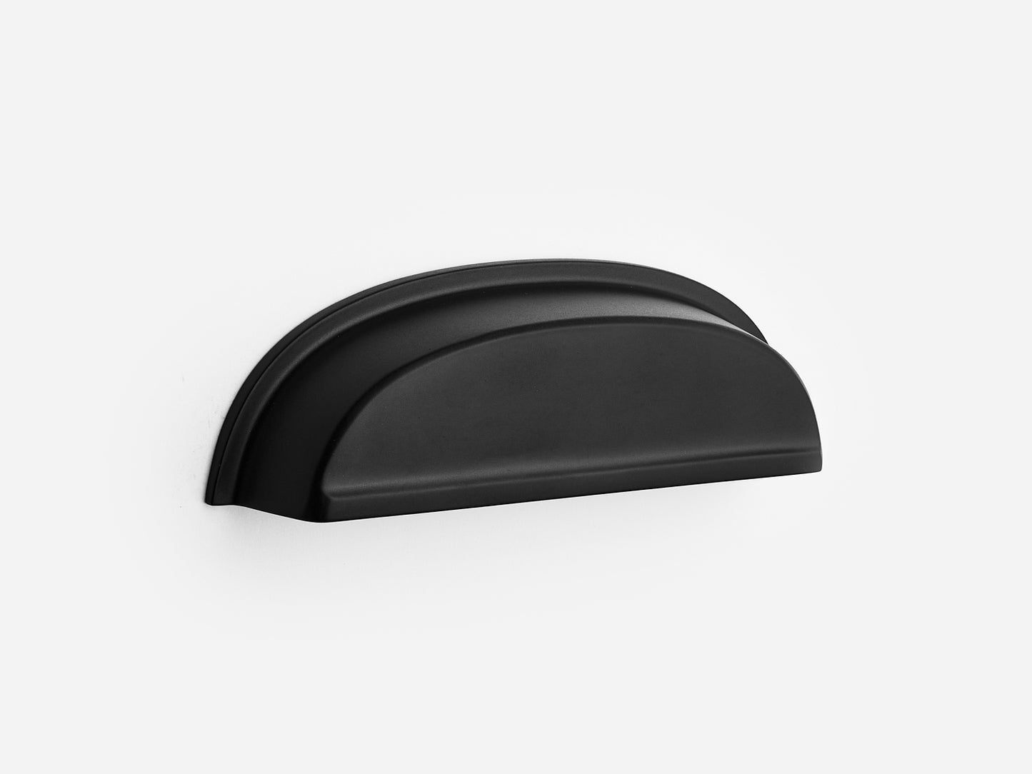Solid brass Royce bin pull, 4 inches, in a matte black finish for cabinets.