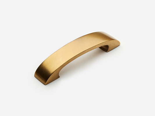 Solid brass Aldo drawer pull, 4 inches, in an aged brass finish for cabinets.